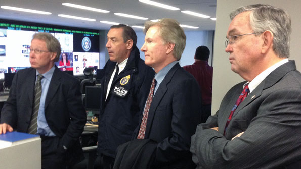 Photo of FirstNet board members and technical staff listen to a Sandy briefing