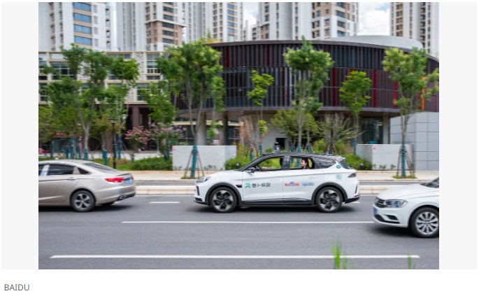 Self-driving taxi runs into jaywalker